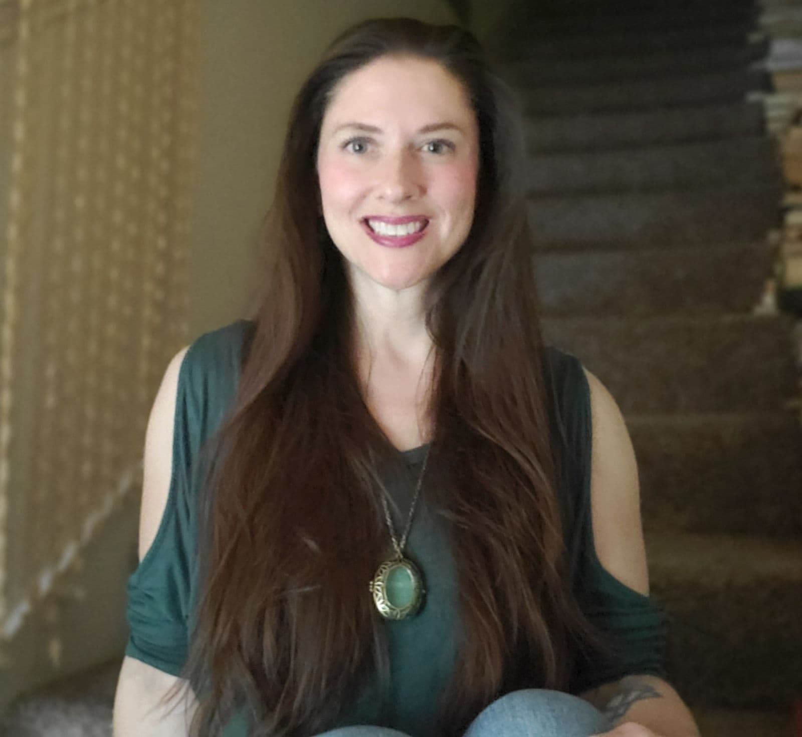 Portrait of the founder of Sapphire Cove Skincare, a woman with a warm and gentle smile